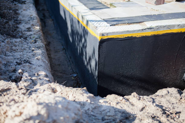 Professional Foundation Crack Repair technician working in Saint Marys, OH